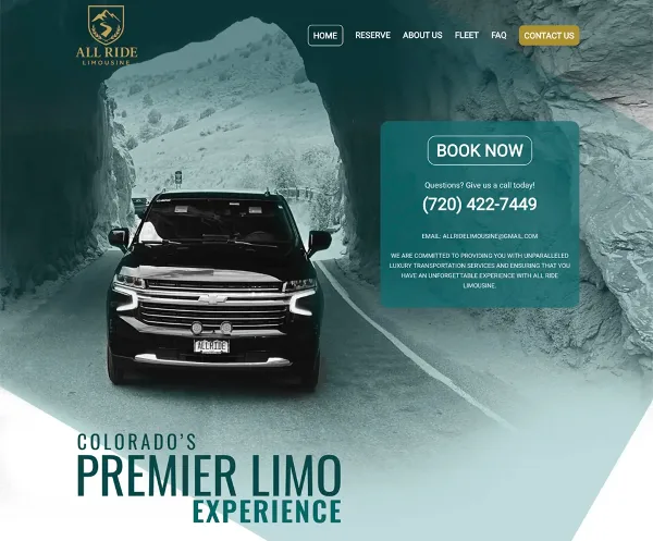 A black Chevrolet SUV driving on a paved road through a rocky mountain landscape.
