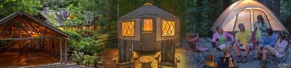 A park lodge, a yurt, and a group shelter in a wooded area with people sitting outside.