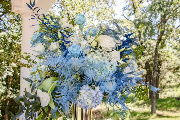 Blue and white wedding floral centerpiece by Queens Floral Design