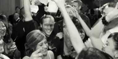 Wedding crowd dancing at a reception to NYC Wedding Music, New York