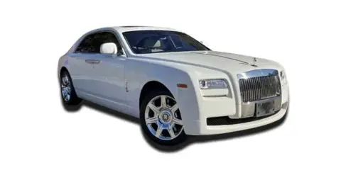 A white Rolls-Royce Ghost luxury sedan parked on a white background.