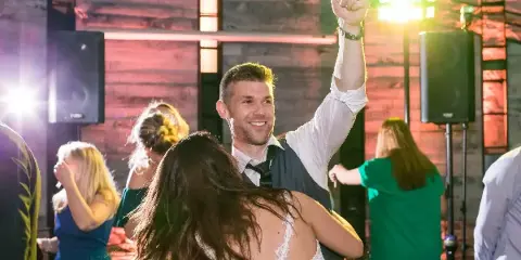 Bride and groom dancing at a wedding reception in Rochester NY