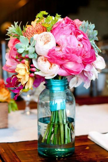 Mason jar wedding centerpiece by Lynn's Floral Design