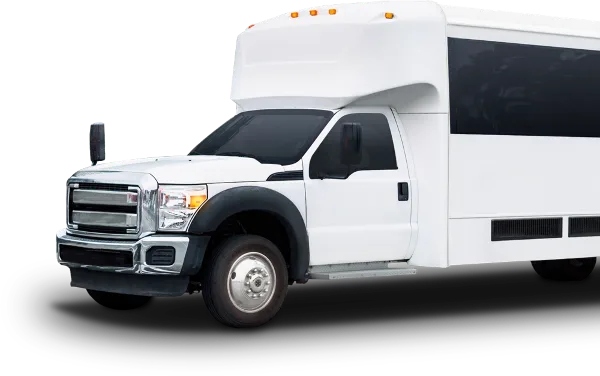 A white shuttle van parked outdoors.