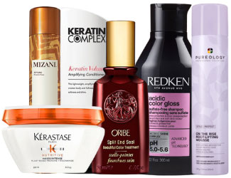 An assortment of professional hair care products including Kérastase, Redken, and Mizani bottles.