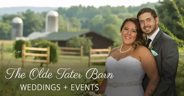 A bride and groom standing in front of a barn and farm landscape with the text 'The Olde Tater Barn Weddings + Events'.