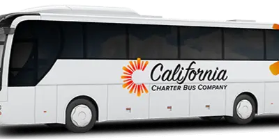 A white charter bus with the California Charter Bus Company logo on the side.