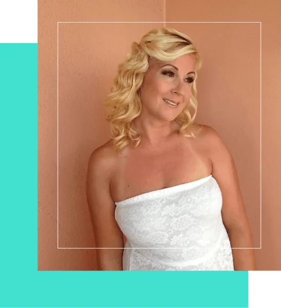 Portrait of a bride with styled blonde hair and professional makeup