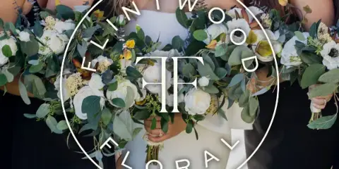 A bride and bridesmaids holding white and green floral bouquets with the Flintwood Floral logo overlaid.