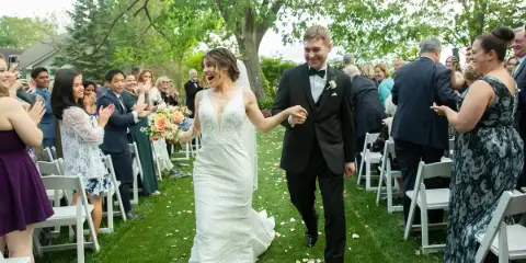 A bride and groom run down the aisle after their wedding ceremony Rockland County Wedding Photographer