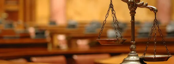 Scales of justice in a courtroom