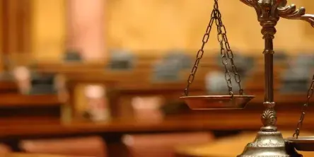 Scales of justice in a courtroom