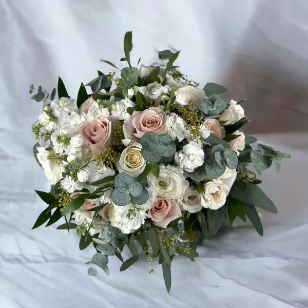 Bridal bouquet by Kittelberger Florist and Gifts, Webster NY