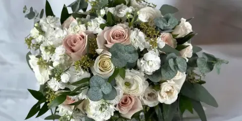 Bridal bouquet by Kittelberger Florist and Gifts, Webster NY