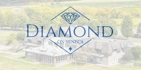 Aerial view of the Diamond on Seneca venue building with a large logo overlay