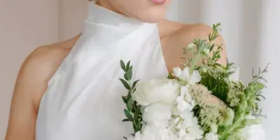 Bride with soft glam makeup and sleek bridal hair in Chicago, IL. Wedding hair and makeup services.