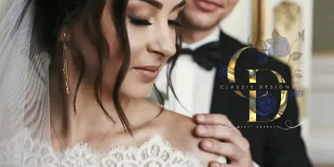 A bride in a lace wedding dress and veil standing next to a groom in a tuxedo, with the Classie Designs Event Company logo overlaid.