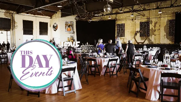 Wedding reception venue with round tables, pink tablecloths, string lights, and guests, with the This Day Events logo overlaid.