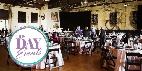 Wedding reception venue with round tables, pink tablecloths, string lights, and guests, with the This Day Events logo overlaid.