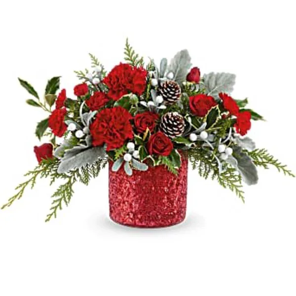 A festive red floral arrangement with carnations, roses, and pinecones in a glittery red vase.