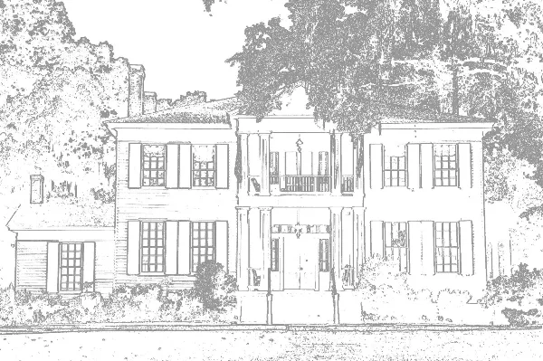 Exterior view of a two-story Greek revival style mansion with a central columned porch and surrounding trees.
