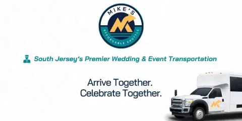 A white shuttle bus with the Mike's Affordable Shuttle logo parked next to the company's logo and tagline.