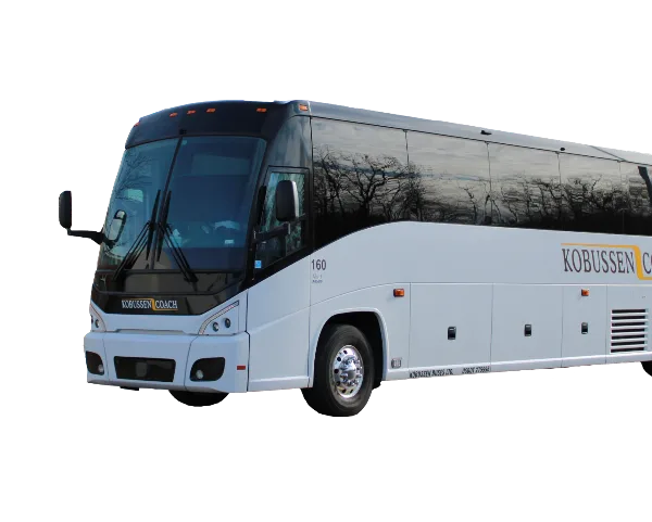 A white Kobussen Buses Ltd. charter bus parked outdoors.