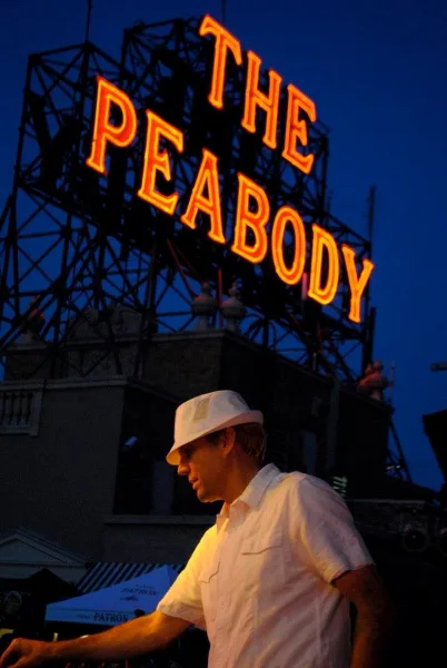 DJ Mark Anderson performing at The Peabody Hotel rooftop event.