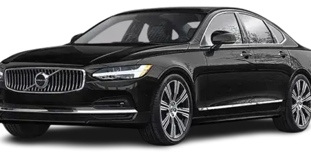 A black luxury sedan parked in a studio setting.