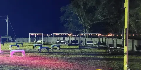 Butler Gardens venue at night with plants