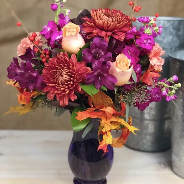 Fall flower arrangement by Genesee Valley Florist