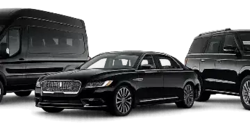 A lineup of black transportation vehicles including a passenger van, a luxury sedan, and an SUV.