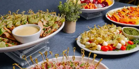 Fingerfood meat skewers with caprese skewers by Paul Evans Catering, Long Island NY