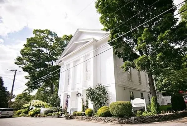 Exterior view of The Commons 1854 historic event venue in Topsfield, Massachusetts