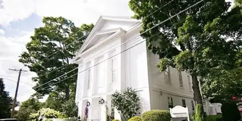 Exterior view of The Commons 1854 historic event venue in Topsfield, Massachusetts