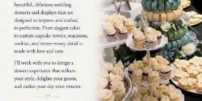 Wedding dessert display with a small cake, macarons, cupcakes, and floral decorations.