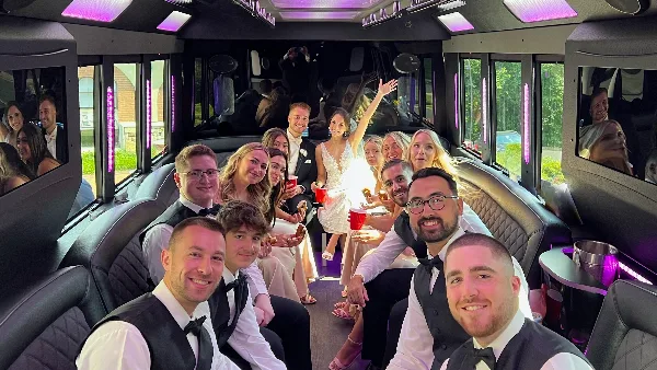 Sterling Limousine - wedding party in a limo bus