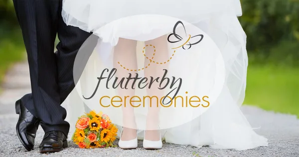 A wedding couple standing together with a sunflower bouquet, featuring the Flutterby Ceremonies logo overlay.