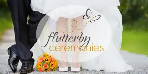 A wedding couple standing together with a sunflower bouquet, featuring the Flutterby Ceremonies logo overlay.