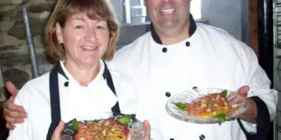 Lynn and Chef Ron, hosts of Flying Pig Roast catering