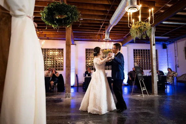 Bride and Groom Dancing with Uplighting in background