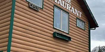 Exterior view of the Silver Fork Lodge and Restaurant log cabin building