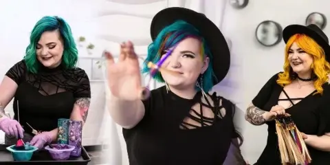 A hair stylist with vibrant blue and rainbow hair in a studio, shown mixing hair dye and holding hair extensions.