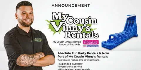 A smiling man in a branded My Cousin Vinny's Rentals polo shirt stands next to a blue inflatable water slide and a business announcement graphic.