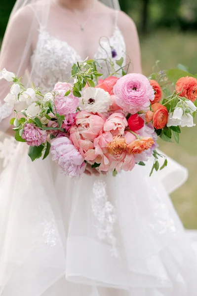 Bridal bouquet with coral and blush garden roses