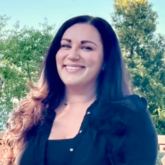 Portrait of Christina Kennedy, founder and wedding officiant at On Point Officiant.
