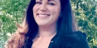 Portrait of Christina Kennedy, founder and wedding officiant at On Point Officiant.