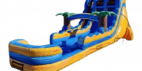 A blue and yellow inflatable water slide with palm tree decorations.