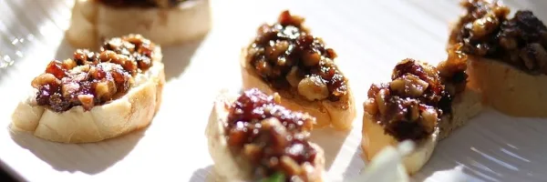 Close-up of prepared appetizers on a white plate
