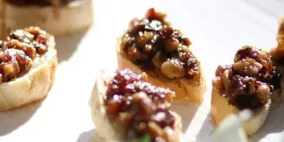 Close-up of prepared appetizers on a white plate